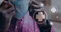 Digital illustration of a man putting on coronavirus covid19 mask over medical icons