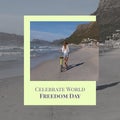 Digital image of caucasian woman with bicycle walking at beach, celebrate world freedom day text
