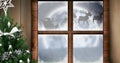 Digital image of christmas tree and wooden window frame against black silhouette of santa claus