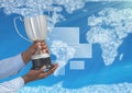 Digital image of hands holding trophy against world map Royalty Free Stock Photo