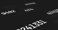 Digital image of multiple changing numbers over data processing against black background Royalty Free Stock Photo