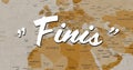Digital image of a white Finis sign appearing in the screen while background shows a brown world map