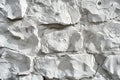 Digital image of white stone rock surface texture background for design and decoration in the interior, closeup. white rough Royalty Free Stock Photo