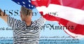 Digital image of a written constitution of the United States moving in the screen while background s