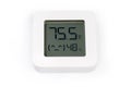 Digital indoor mini thermometer with hygrometer on a white surface