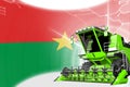 Digital industrial 3D illustration of green advanced grain combine harvester on Burkina Faso flag - agriculture equipment