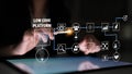 Digital Interaction with Low Code Platform Interface Featuring Touchscreen, Data Flow, and Application Development Icons Royalty Free Stock Photo