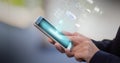 Digital interface with data processing over person using smartphone Royalty Free Stock Photo