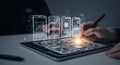 Person Using Tablet to Sketch Digital Interface Design on White Desk with Light Flare, Creating UI UX Concept Royalty Free Stock Photo
