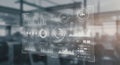 Digital interface displayed in a modern office setting, featuring an array of data Royalty Free Stock Photo