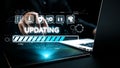 Digital interface showing updating progress bar with icons for technology, security, and data management against a dark Royalty Free Stock Photo