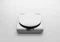 Digital kitchen scale with a sleek, Royalty Free Stock Photo