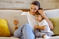 Digital Leisure. Happy Young Mother And Little Daughter Using Tablet Computer Together Royalty Free Stock Photo