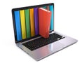 Digital library and online education concept - laptop computer with colorful books Royalty Free Stock Photo