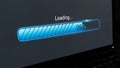 Digital loading screen progress bar at 99 percent on laptop display Royalty Free Stock Photo
