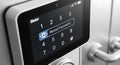 Digital lock keypad with a rectangular display showing numbers 1-9 and special Royalty Free Stock Photo