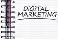 Digital marketing words on spring note book Royalty Free Stock Photo