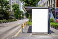 Digital Media blank mock up advertising billboard in the bus stop, blank billboards public commercial with passengers, signboard Royalty Free Stock Photo