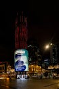 Digital media wrap around display at night in Yagan Square, Perth, Australia