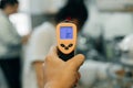 Digital medical infrared forehead thermometer gun non-contact of measuring temperature, for coronavirus testing Royalty Free Stock Photo