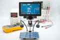 Digital Microscope and Circuit Board in Lab Royalty Free Stock Photo