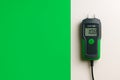 Digital moisture meter measuring wall humidity Royalty Free Stock Photo