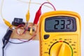 Digital multimeter with board Royalty Free Stock Photo