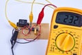 Digital multimeter with board Royalty Free Stock Photo