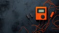 Digital multimeter with probes on dark background Royalty Free Stock Photo