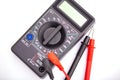 Digital multimeter and probes on white background Royalty Free Stock Photo