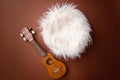 Digital newborn background for baby girls and boys. Brown backdrop and little guitar Royalty Free Stock Photo