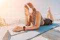 Woman laptop sea. Working remotely on seashore. Happy successful woman female freelancer working on laptop by the sea at Royalty Free Stock Photo