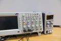 The digital oscilloscope on the desk