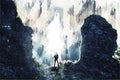 Digital painting of fantasy image, man standing on path between rock and cliff Royalty Free Stock Photo