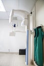 Digital panoramic x-ray dental machine and protection vest with Royalty Free Stock Photo