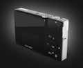 Digital photo camera on black gradient background 3d render Royalty Free Stock Photo