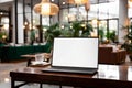 Digital professionalism Laptop with blank screen in hotel reception lounge