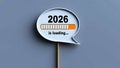 Digital progress bar in speech bubble showing \'2026 is loading...\', anticipation for the new Royalty Free Stock Photo