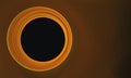 Digital representation of black hole, golden eclipse or galactic 3d portal into dark empty space.