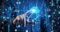 Futuristic hand touching glowing cloud symbol amidst digital data streams and network nodes Royalty Free Stock Photo