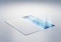 A digital representation shows a piece of paper transforming into a stream of glowing blue particles Royalty Free Stock Photo