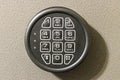 Digital safe keypad casting shadow