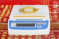 Digital scales for weighing gold necklace Royalty Free Stock Photo