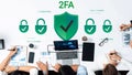 Digital Security Concept with Two-Factor Authentication Featuring Lock Illustrations and Team Collaboration at a Desk Royalty Free Stock Photo