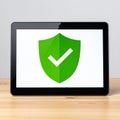 Digital Security Shield on a Modern Tablet Screen Royalty Free Stock Photo