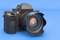 Digital single-lens reflex camera on blue backdrop, 3D rendering Royalty Free Stock Photo