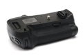 A digital single lens reflex camera vertical battery grip