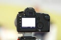 Digital SLR camera close-up on a tripod Royalty Free Stock Photo