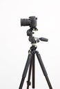 Digital slr camera on a tripod Royalty Free Stock Photo