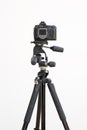 Digital slr camera on a tripod Royalty Free Stock Photo